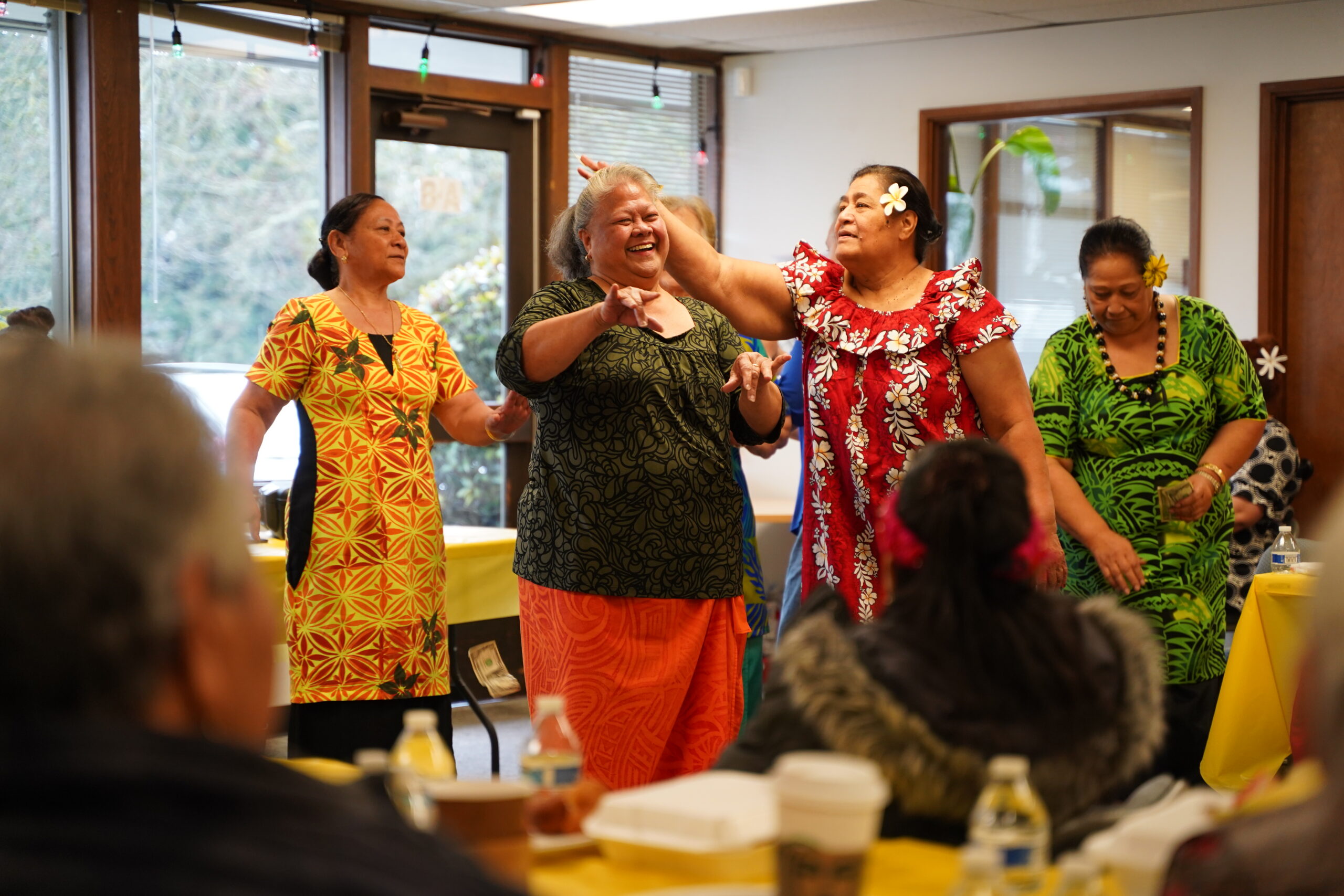 Samoan elders dancing (siva) in the Pasifika Wellness Center at PICA-WA.